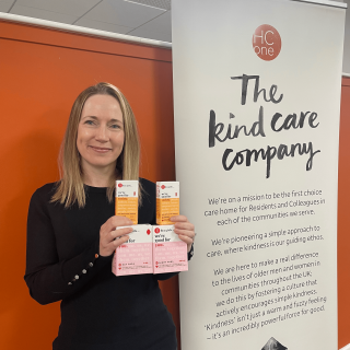 Kate Ward holding Hey Girls products
