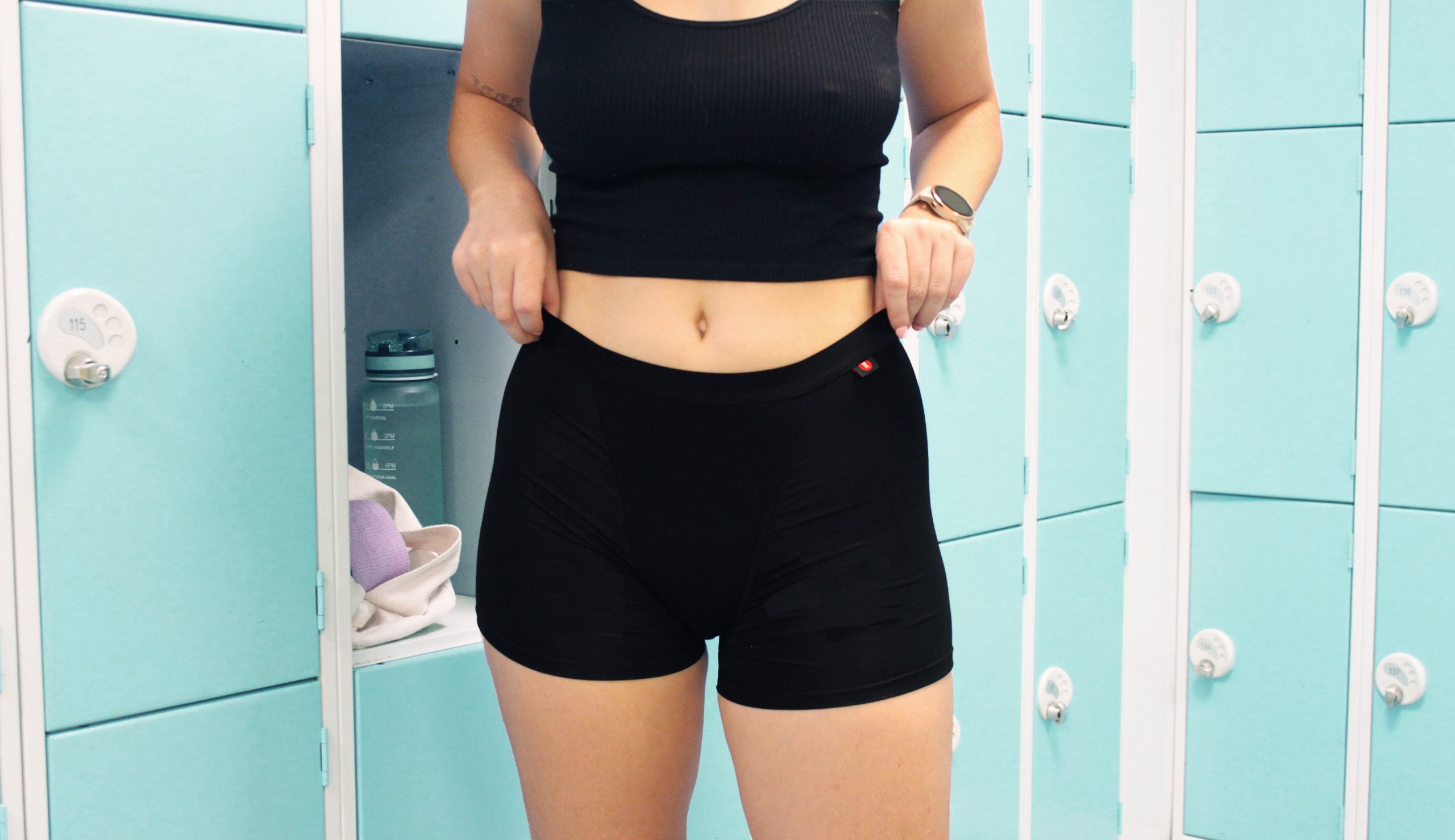 periodshort3 Wearing Period shorts stood at the gym locker