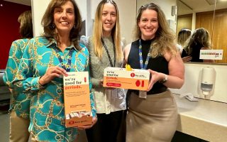 N colleagues Emma-Jane Stewart, Demi Nicol and Sophie Krempasky with Hey Girls products